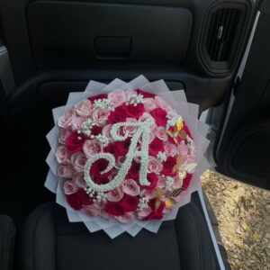 Radiant Love 75 Pink Roses with Baby’s Breath & Gold Butterfly Accents